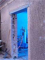 View of the new doorway from the theatre.  Notice that the wall is three bricks thick!  Click for a larger picture.